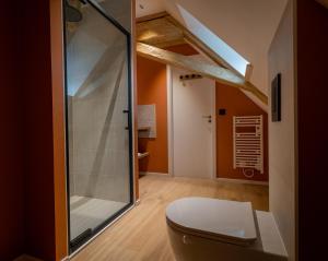 Appartements Le 1552 - Gite de charme - Parking Gratuit : photos des chambres
