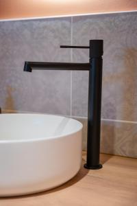 Appartements Le 1552 - Gite de charme - Parking Gratuit : photos des chambres