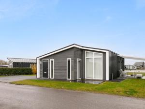 Chalet in Zeeland by Scenic Pond