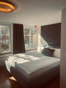 Deluxe Family Bedroom with Mountain View & Terrace room in BELLEVUE Boutique B&B am Brienzersee / Iseltwald