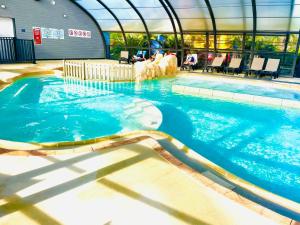 Campings Cottage Premium, camping 5* avec parc aquatique : photos des chambres