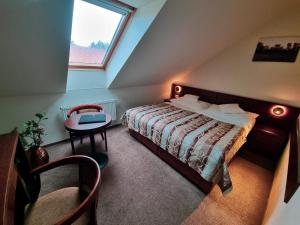 Economy Double or Twin Room - Attic room in Hotel Mario