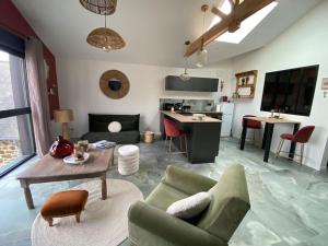Appartements L'Atelier 48 : photos des chambres