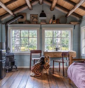 Cabin by Byske river surrounded by the forest