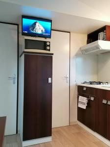 Chalets Entre Mer et Roseaux - Piscine - Proche centre et mer - Petfriendly : photos des chambres