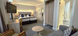 Classic Twin Room with Sofa room in The Empress Hotel
