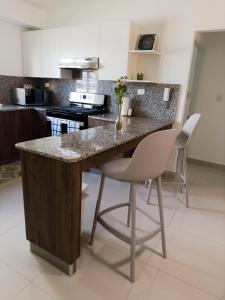 Apartamento Coral azul