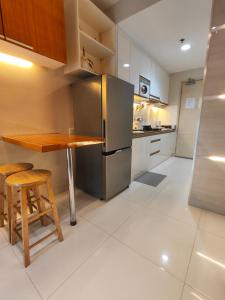 Sea Residences 5mins walk to SM MoA, Arena, SMX, 55" GoogleTV