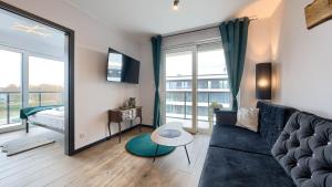 Apartament Przy Porcie z klimatyzacją, garażem i rowerami