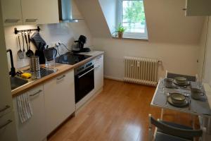 Modern 2.5 Bedroom Duplex Apartment near Messe, Airport, Arena