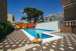 Tolles Appartement in Promajna mit gemeinschaftlichem Pool und Terrasse und Neben dem Strand