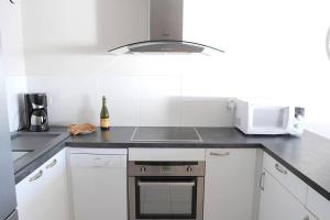Appartements Le pieds dans l-eau - Direct sur la mer : photos des chambres