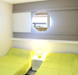 Appartements Le pieds dans l-eau - Direct sur la mer : photos des chambres