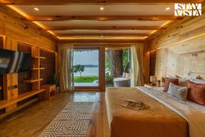 StayVista at Exotica Kabini -Meals Included - Riverfront Villa