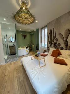 Appartements Le Nid d'Eliyah, suites avec jacuzzi 15min Disneyland Paris : photos des chambres