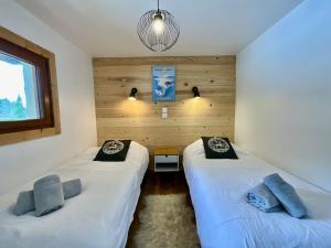 Chalets Chalet du Pre - Sauna, terrasse et grand jardin : photos des chambres