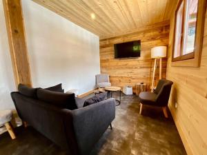 Chalets Chalet du Pre - Sauna, terrasse et grand jardin : photos des chambres