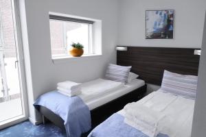 Twin Room with Balcony room in ApartHotel Faber