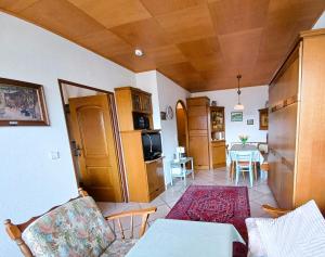 LENA Haus KMB Seeappartement am Ossiacher See mit direktem Seezugang und Hallenbad