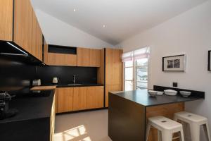 Appartements Appartement neuf vue mer au coeur de la Flotte : photos des chambres