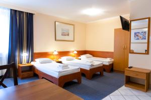 Standard Triple Studio room in Apartamenty Metro Wileńska