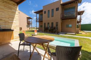 Beachfront Duplex #A10 em Barro Preto by Carpediem