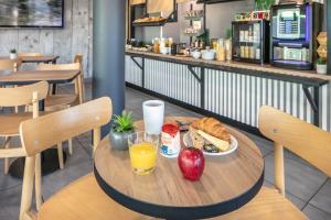 Hotels B&B HOTEL Lyon Aeroport Saint-Quentin-Fallavier : photos des chambres