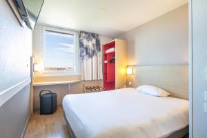 Hotels B&B HOTEL Lyon Aeroport Saint-Quentin-Fallavier : photos des chambres