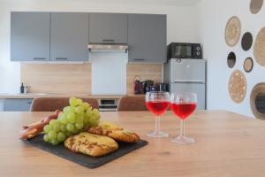 Appartements L-Escale cosy, proche Euroairport : photos des chambres