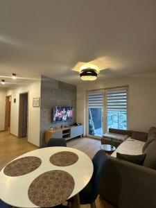 Przytulny apartament z dużym balkonem