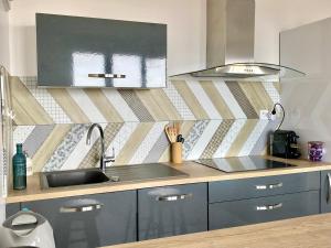 Appartements LESPARISNORMANDS - le Pokerdas 1 : photos des chambres