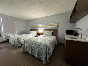 Studio Room with Two Double Beds Non-Smoking room in HomeTowne Studios Richmond VA - W Broad St