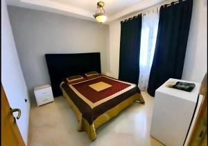 Appartement 141m2 Moderne Haut Standing de 3 Chambres - Internet Fibre à Ennasr 2 - Idéal pour Famille - Service Navette