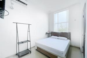 Citara Jaya Guesthouse Mitra RedDoorz - 2hvězdičkové hotely ve městě Bekasi