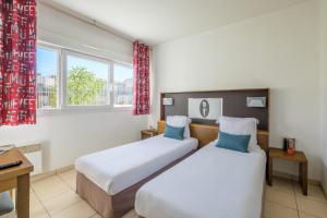 Two-Bedroom Apartment (6 Adults) room in Zenitude Hôtel-Résidences Le Maestria