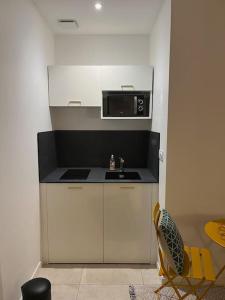 Appartements Charmant Studio / Centre ville : photos des chambres