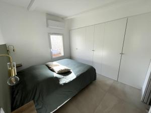 Villas Charmante maison avec piscine : photos des chambres