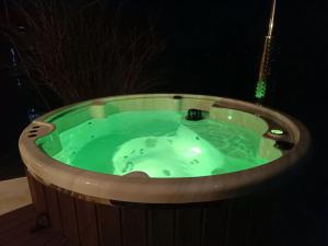 Holiday Home "Sleme" with jacuzzi, big garden and arbor with fireplace