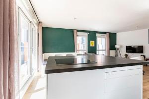 Grand appartement , Paris la Défense Arena, 50 mètres de la gare, 15 min Champs elysées