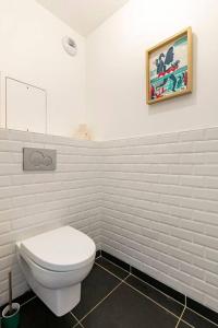 Grand appartement , Paris la Défense Arena, 50 mètres de la gare, 15 min Champs elysées