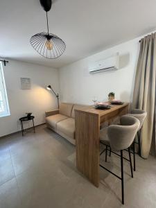 Appart'hotels SOUS LES PLATANES : photos des chambres