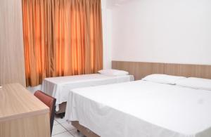 Hotel Manoá Poa - Ambiente simples, acolhedor, equipe atenciosa e localização estratégica no centro de Poa, próx a UFRGS, rodoviária e a Santa Casa