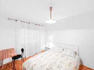 Appartements Jardin Secret - Maison Proche de l-Hippodrome : photos des chambres