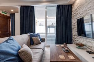 Designer 1 bed Maisonette Swieqi by Homely