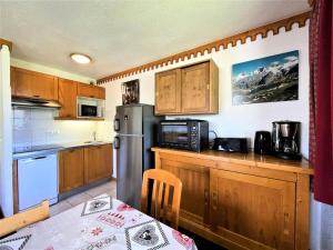 Résidence Bosson - Appartement 8 personnes ski aux pieds aux Ménuires MAE-3814