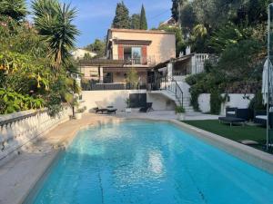 Appartements Rez de villa avec piscine : photos des chambres