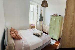 Appartements Charmante Maison de village : photos des chambres