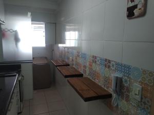 Apartamento frente mar pé na areia