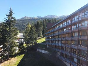 Résidence Belles Challes - Studio 4 personnes à Arc 1800 skis aux pieds et proche des commerces dans le village du Charvet MAE-2115