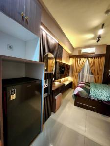 Apartemen Green Pramuka City by BOBOLELAP